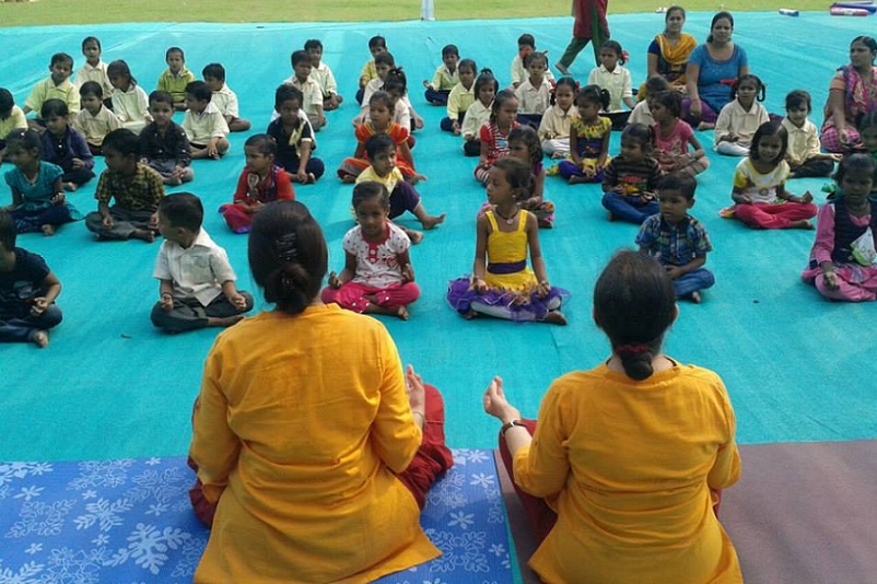 children learning yoga